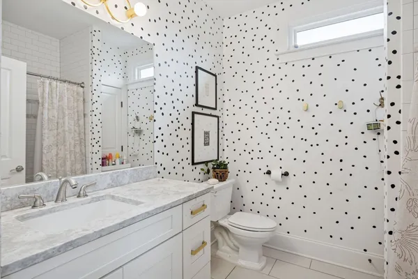 a bathroom with a shower and a bathtub
