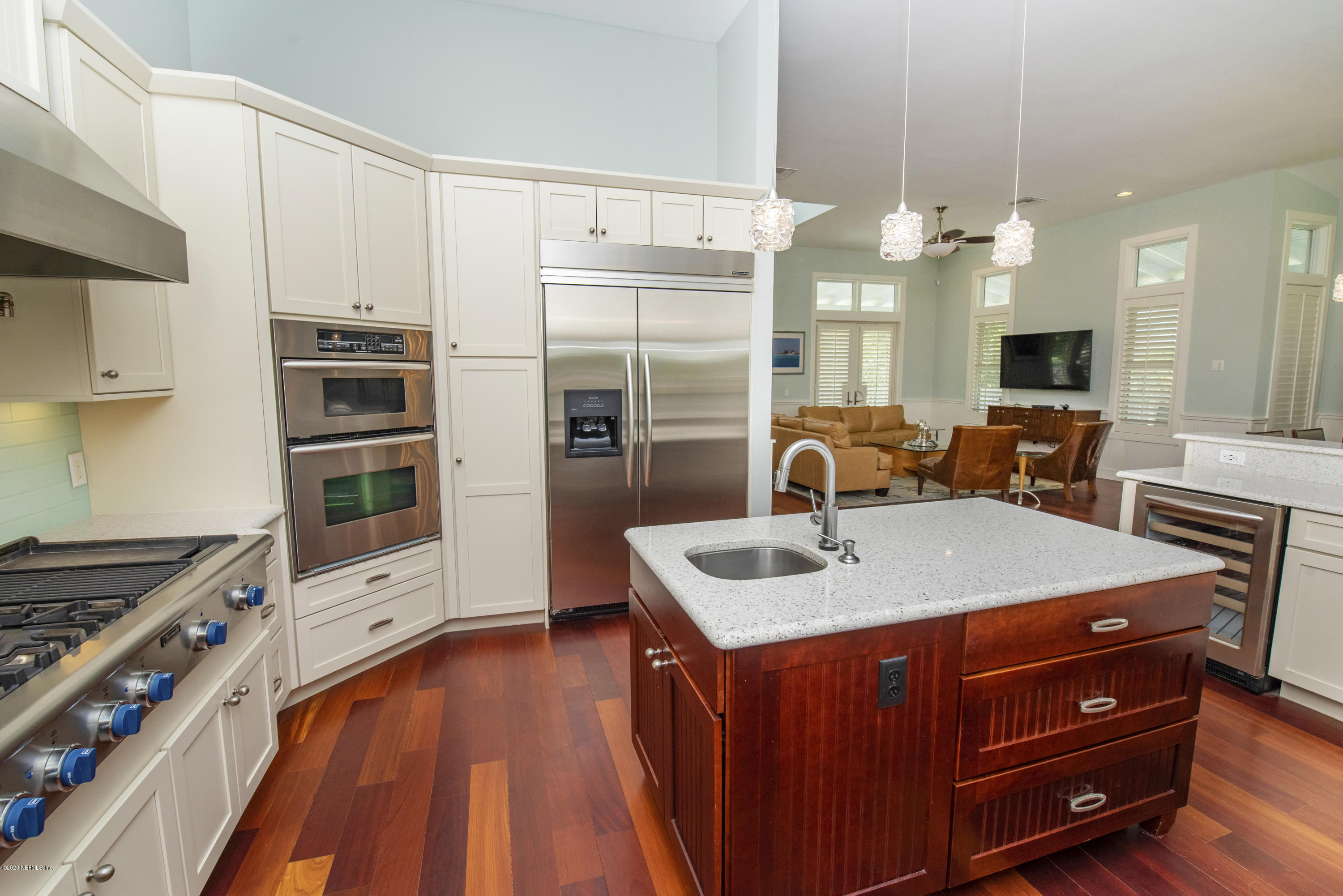 529 Barefoot Trace Circle St. Augustine, FL 32080 - Photo 15 of 62 a kitchen with kitchen island granite countertop a sink cabinets and stainless steel appliances