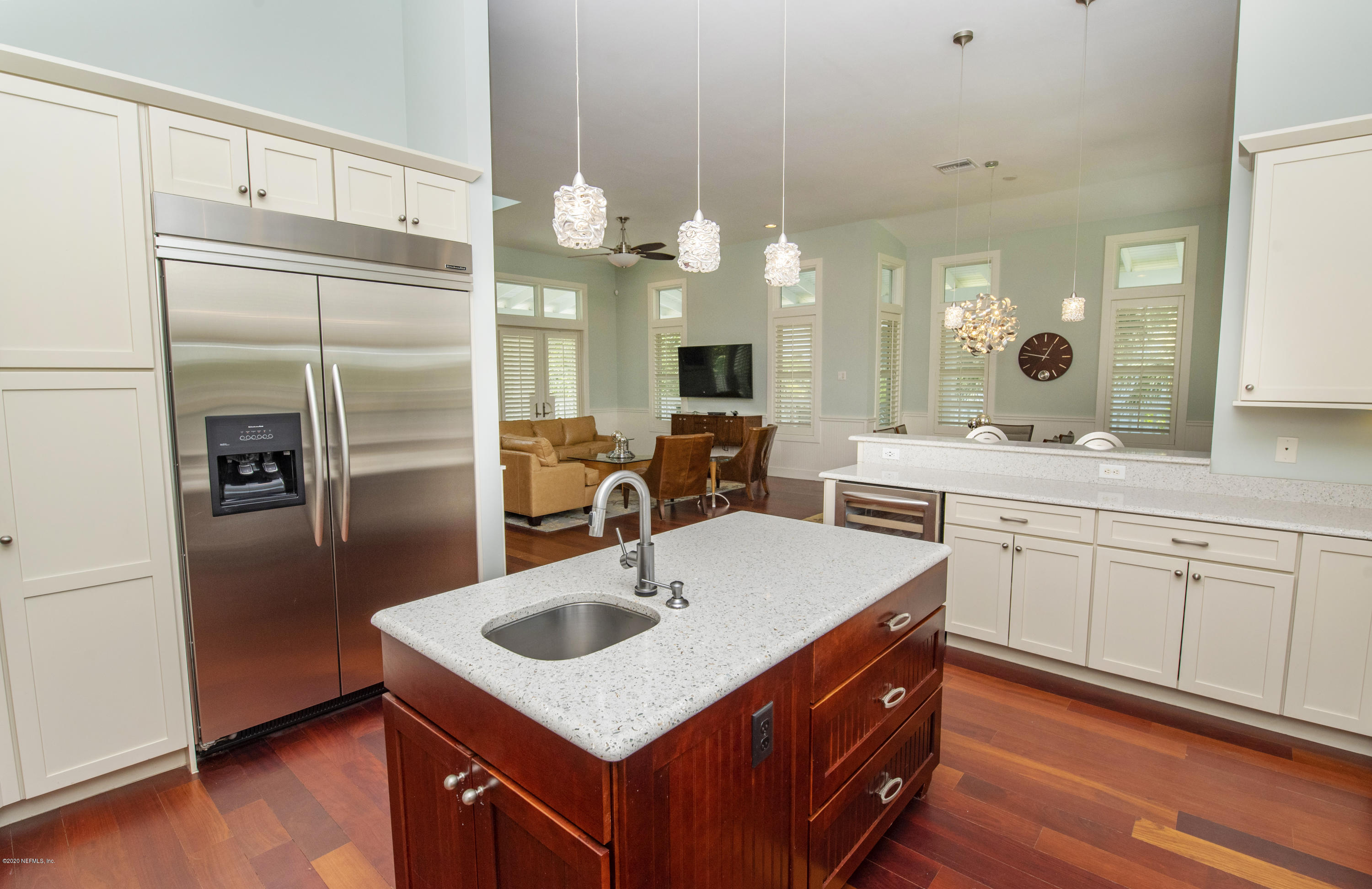 529 Barefoot Trace Circle St. Augustine, FL 32080 - Photo 18 of 62 a kitchen with a sink a counter top stainless steel appliances and cabinets