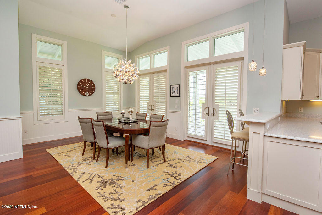 529 Barefoot Trace Circle St. Augustine, FL 32080 - Photo 20 of 62 a view of a dining room with furniture window and wooden floor