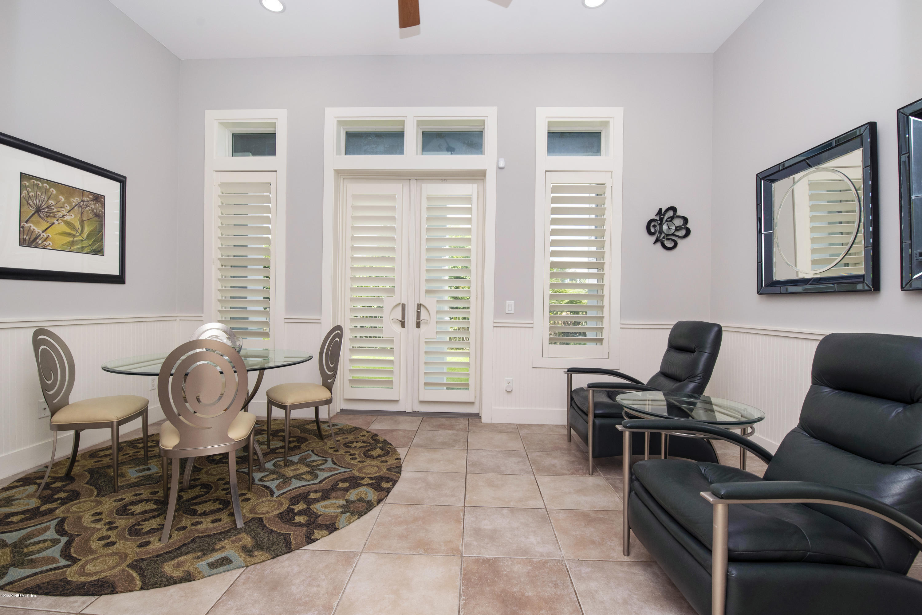 529 Barefoot Trace Circle St. Augustine, FL 32080 - Photo 21 of 62 a view of a workspace with furniture and a window