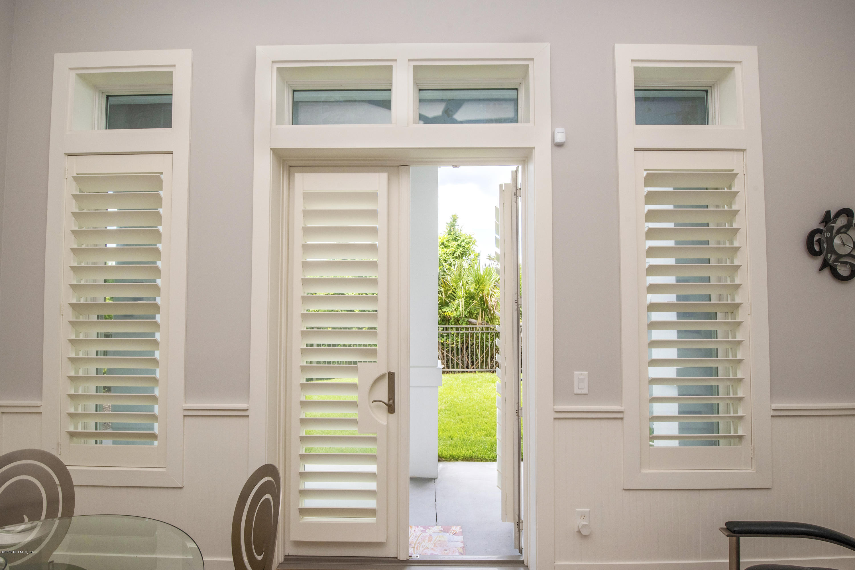 529 Barefoot Trace Circle St. Augustine, FL 32080 - Photo 23 of 62 a bathroom with a sink a bathtub and a window