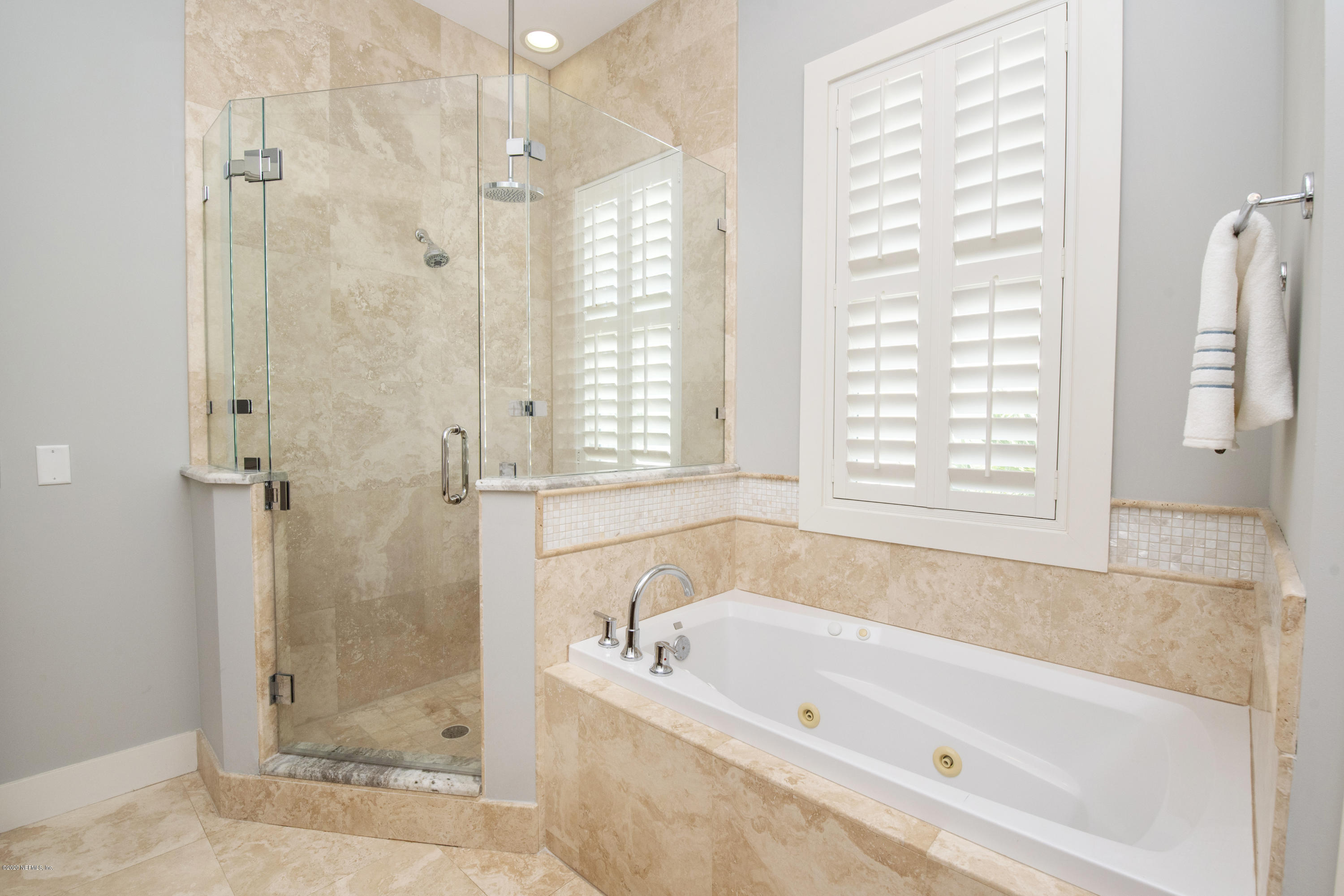 529 Barefoot Trace Circle St. Augustine, FL 32080 - Photo 28 of 62 a white bath tub sitting next to a shower