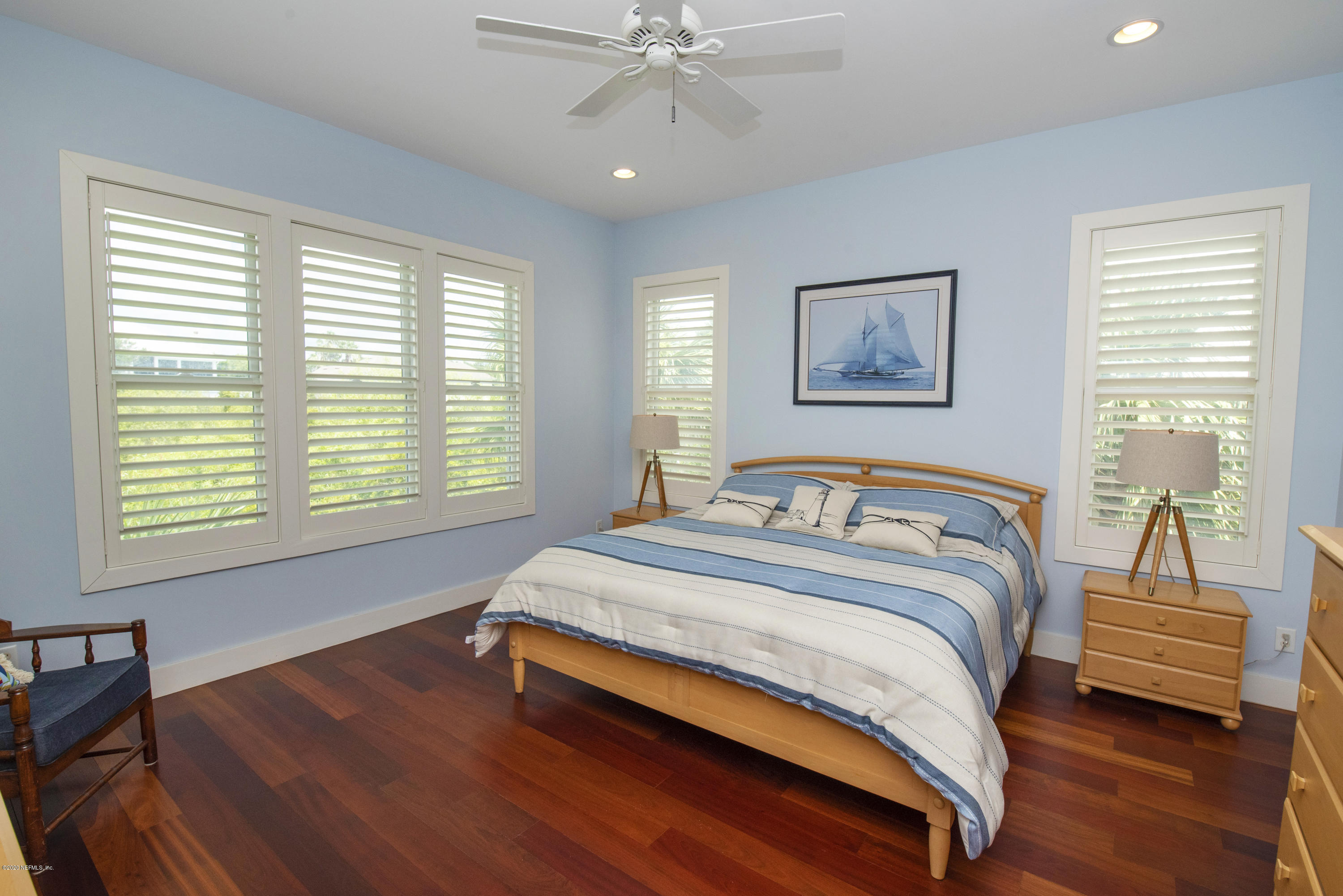 529 Barefoot Trace Circle St. Augustine, FL 32080 - Photo 30 of 62 a spacious bedroom with a bed and a window