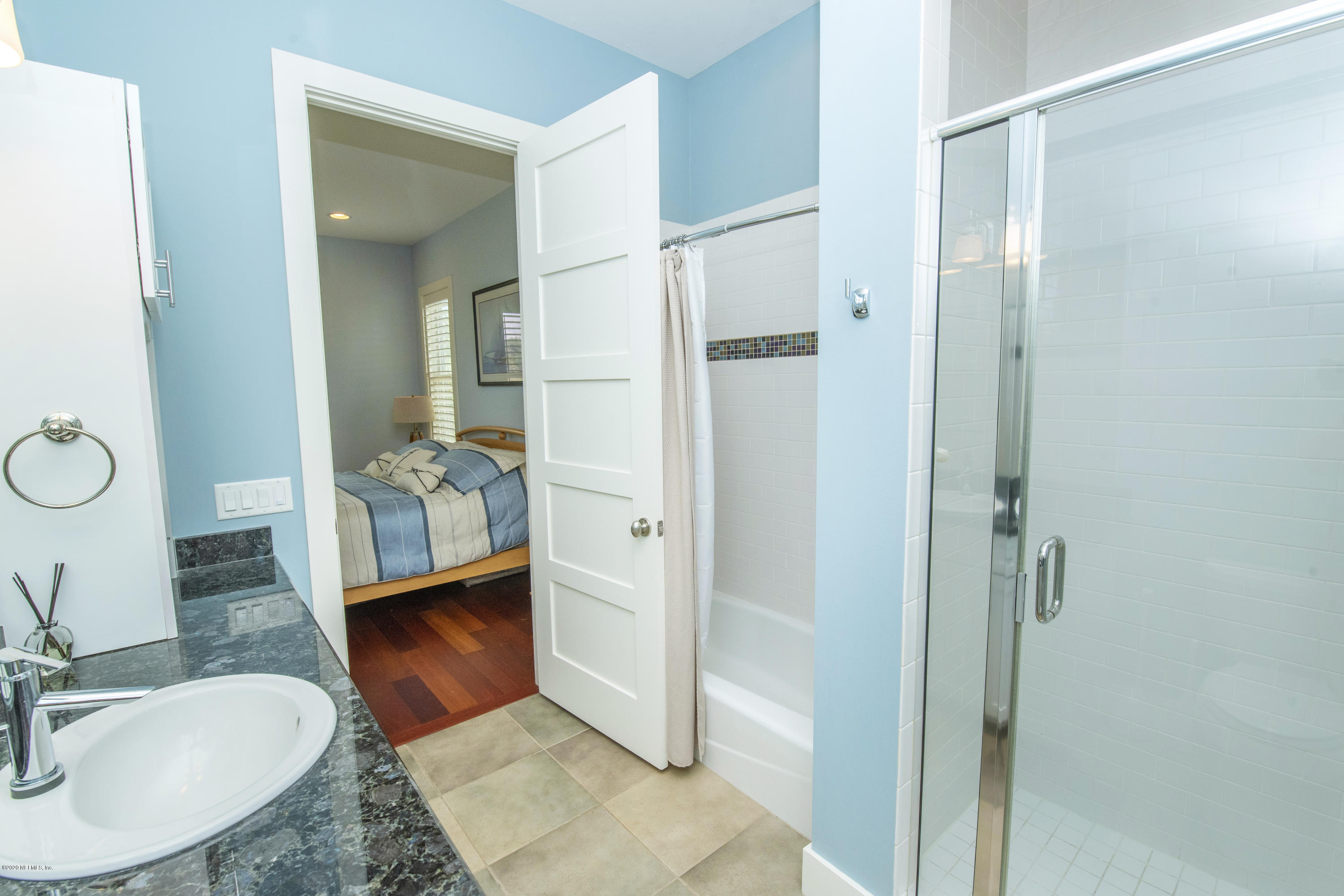 529 Barefoot Trace Circle St. Augustine, FL 32080 - Photo 34 of 62 a bathroom with a sink and a mirror