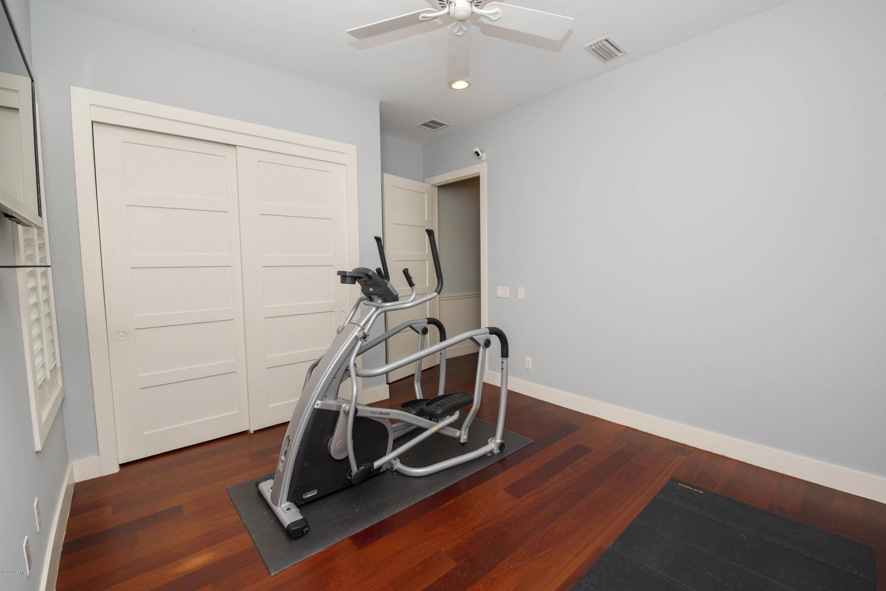 529 Barefoot Trace Circle St. Augustine, FL 32080 - Photo 44 of 62 a view of a room with gym equipment
