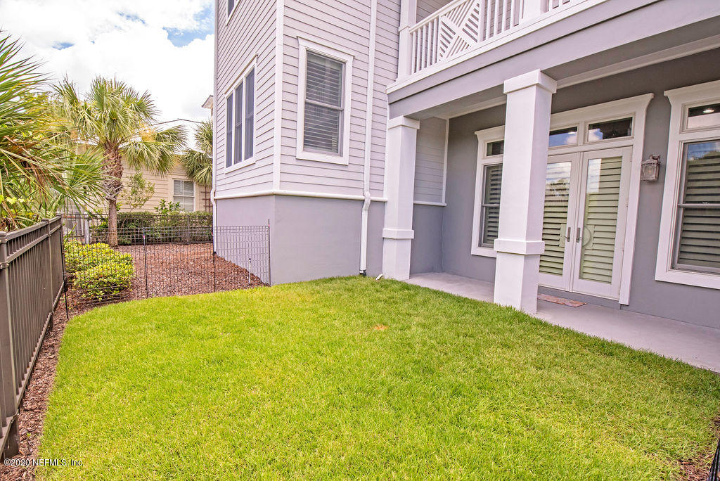 529 Barefoot Trace Circle St. Augustine, FL 32080 - Photo 52 of 62 front view of a house with a yard