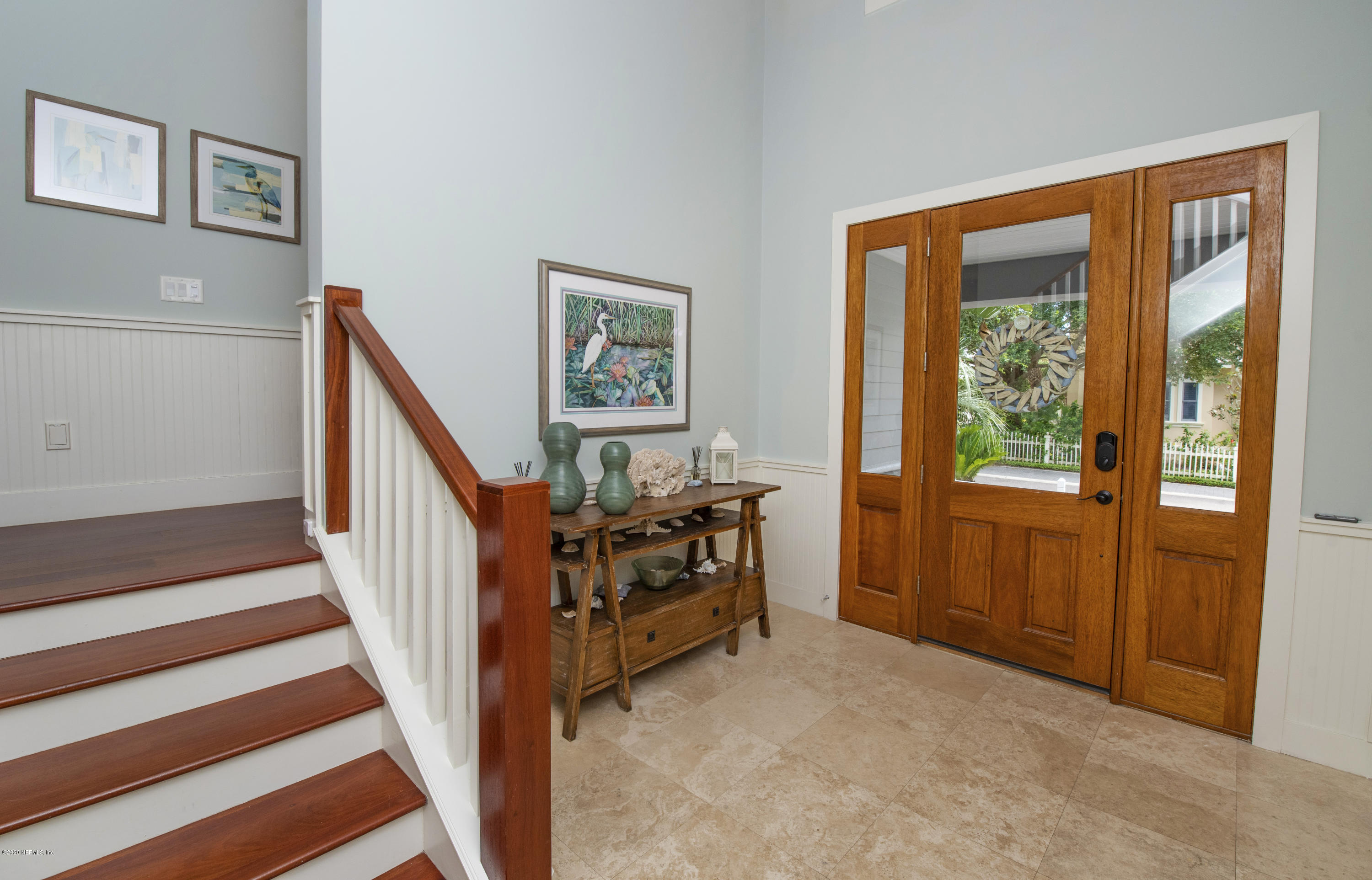 529 Barefoot Trace Circle St. Augustine, FL 32080 - Photo 6 of 62 a view of an entryway with wooden floor and windows