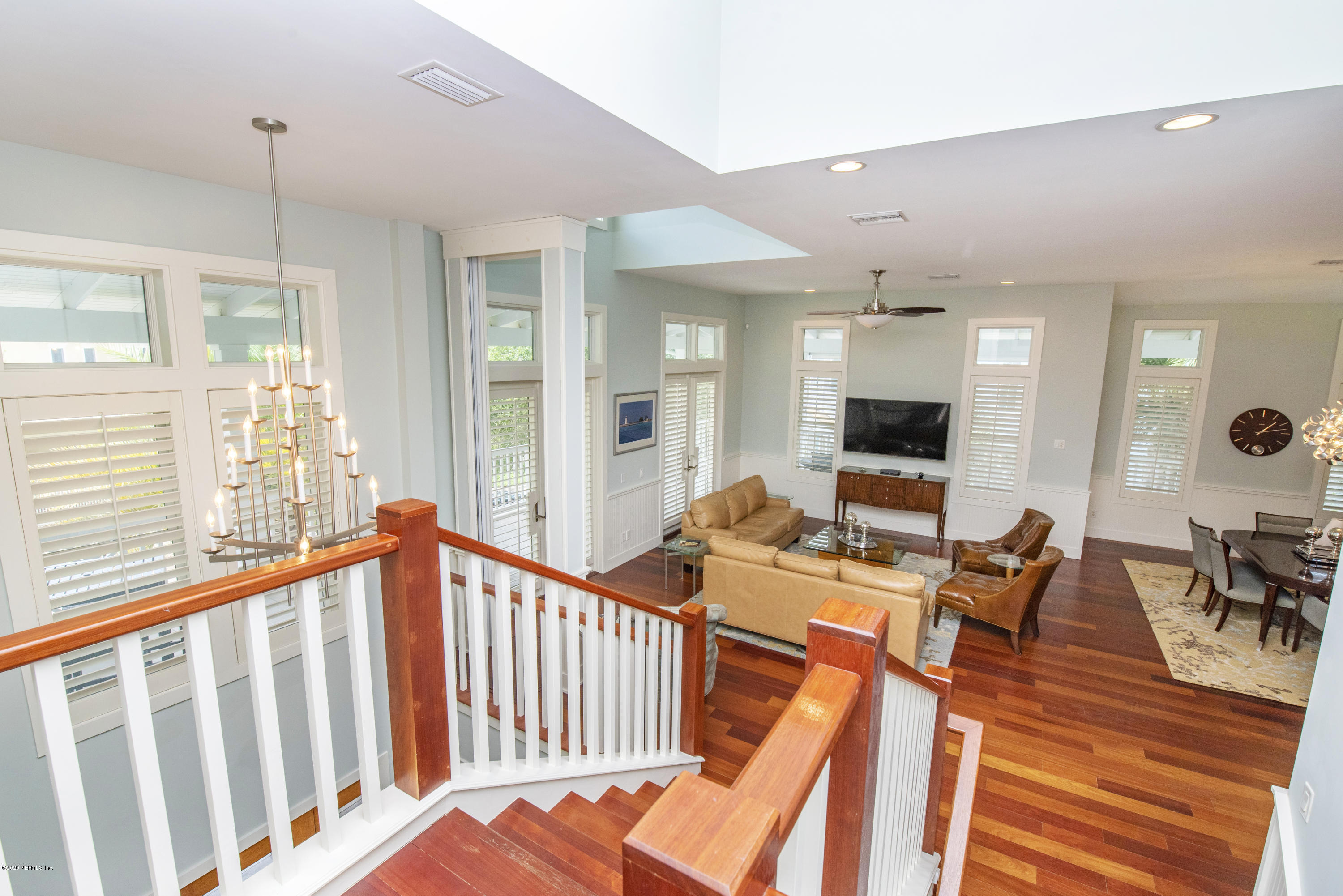 529 Barefoot Trace Circle St. Augustine, FL 32080 - Photo 7 of 62 a living room with furniture a wooden floor and a large window