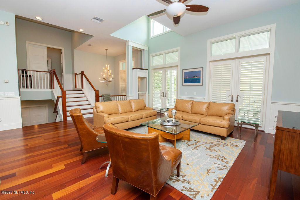 529 Barefoot Trace Circle St. Augustine, FL 32080 - Photo 10 of 62 a living room with furniture and wooden floor