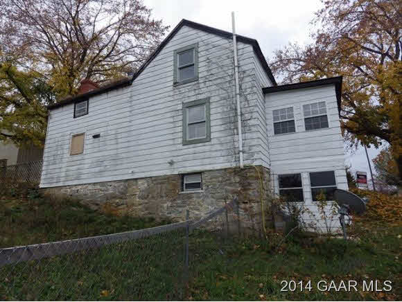27 Mish Barn Road Middlebrook, VA 24459 - Photo 11 of 13 a front view of a house with a garden