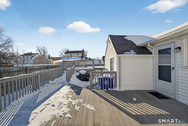 a view of a balcony and chairs