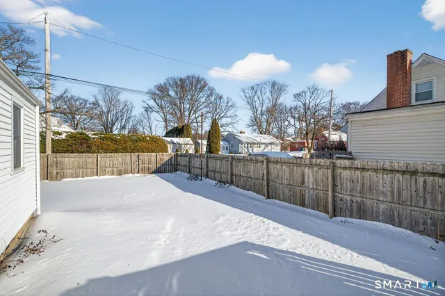 a view of a street with a building in the background