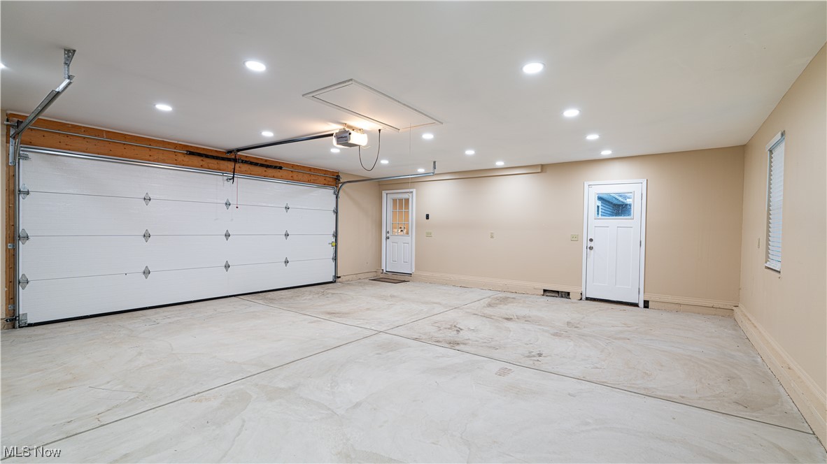 6264 Herbert Road Canfield, OH 44406 - Photo 33 of 47 Garage featuring recessed lighting and a garage door opener