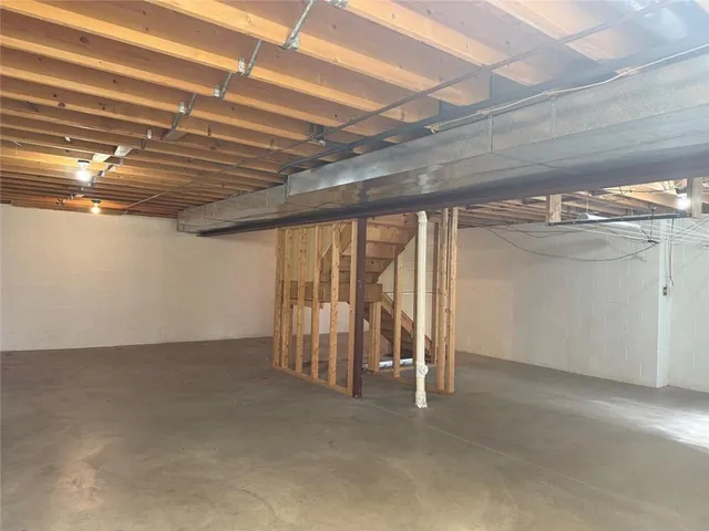 a view of a two chairs in the balcony