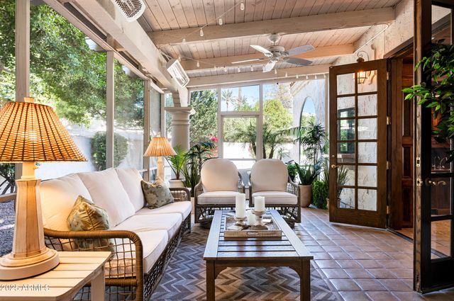 a view of a yard with furniture