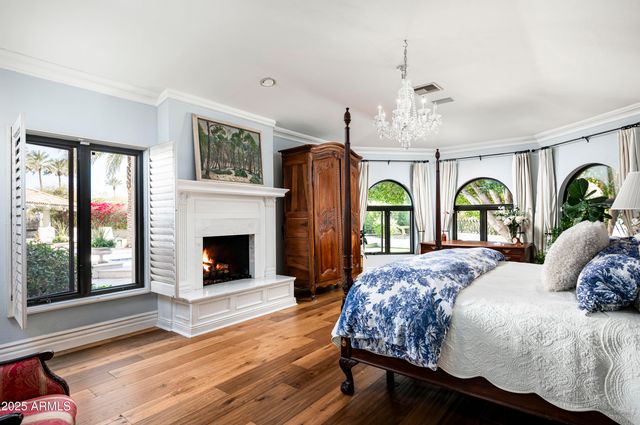 a view of swimming pool with outdoor seating and a patio
