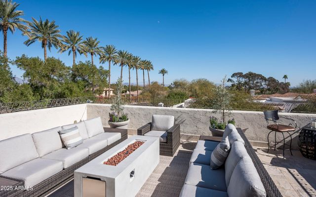 a bedroom with a bed and a book shelf