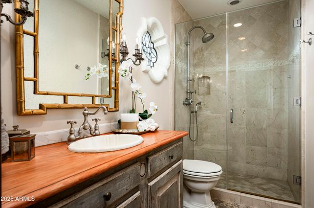 an aerial view of a house with a garden