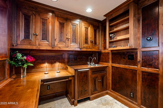 a kitchen with stainless steel appliances granite countertop a stove and a refrigerator