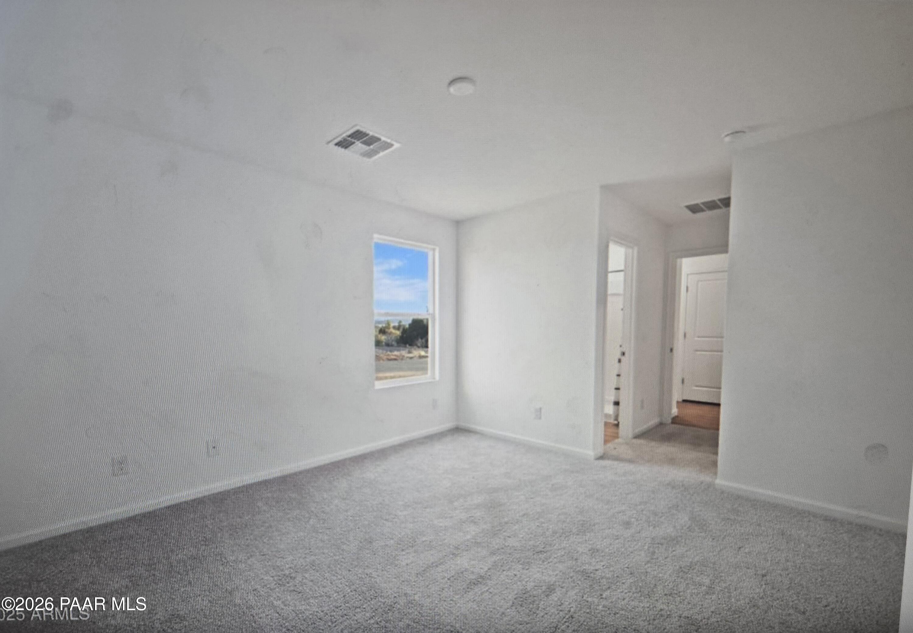 20182 East Lakeside Road Cordes Lakes, AZ 86333 - Photo 12 of 20 a view of an empty room with a window