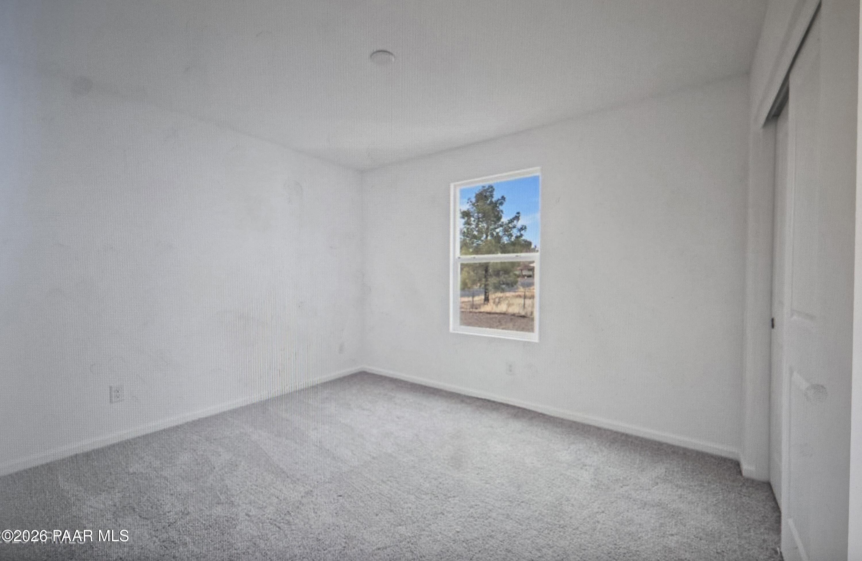 20182 East Lakeside Road Cordes Lakes, AZ 86333 - Photo 16 of 20 an empty room with windows