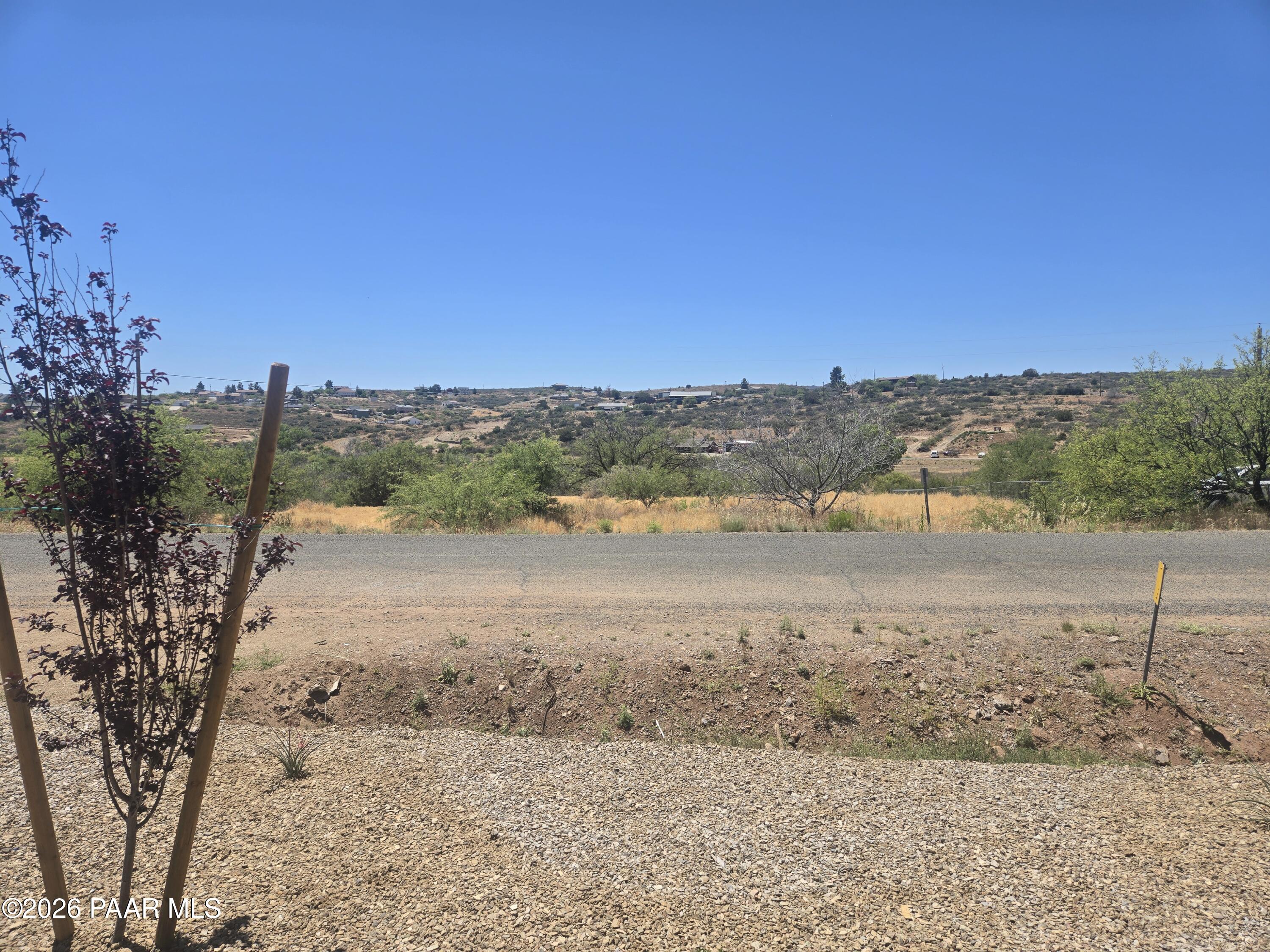 20182 East Lakeside Road Cordes Lakes, AZ 86333 - Photo 19 of 20 a view of a road with a yard