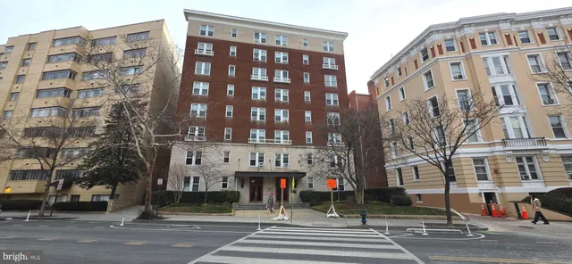 a view of a building with a street
