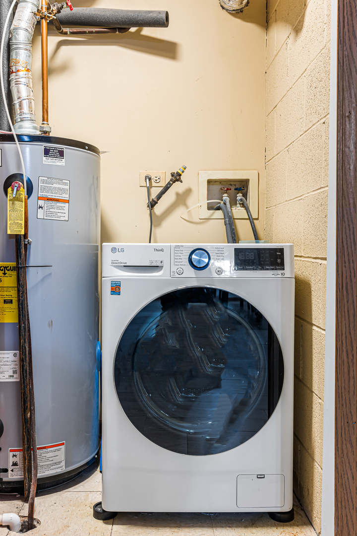 1226 Chalet Road, Unit 2102 Naperville, IL 60563 - Photo 27 of 28 a utility room with dryer and washer