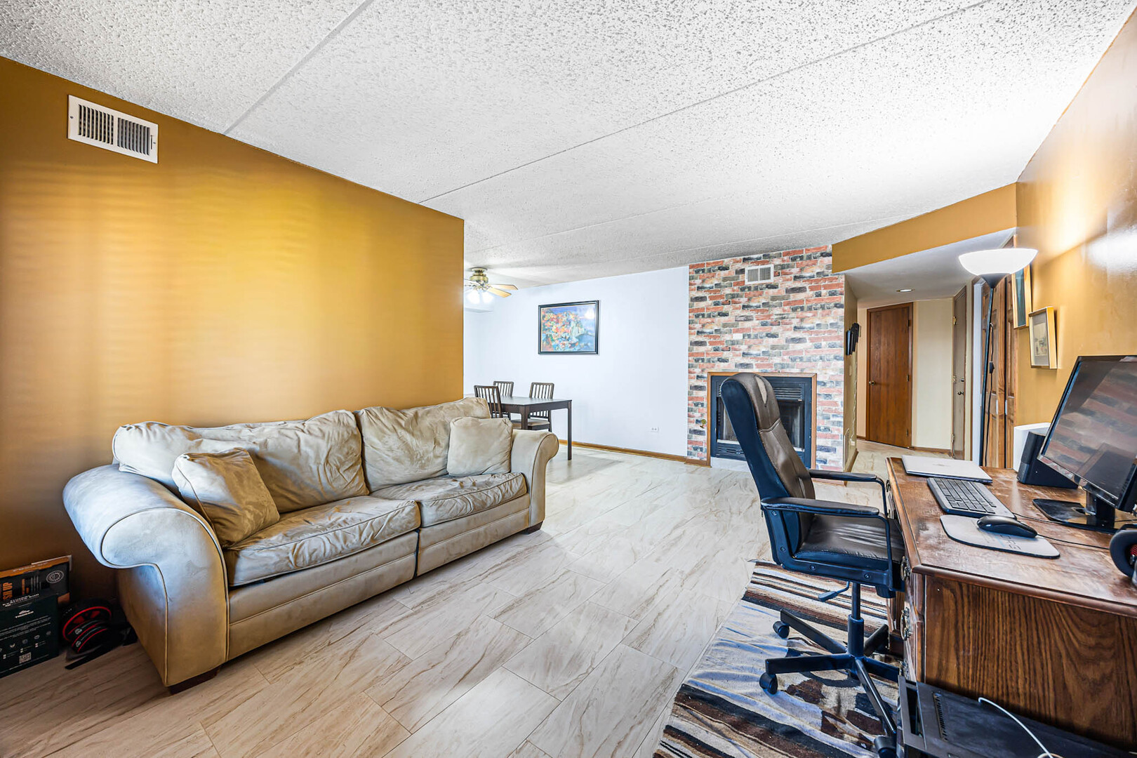 1226 Chalet Road, Unit 2102 Naperville, IL 60563 - Photo 4 of 28 a living room with furniture fireplace and a flat screen tv