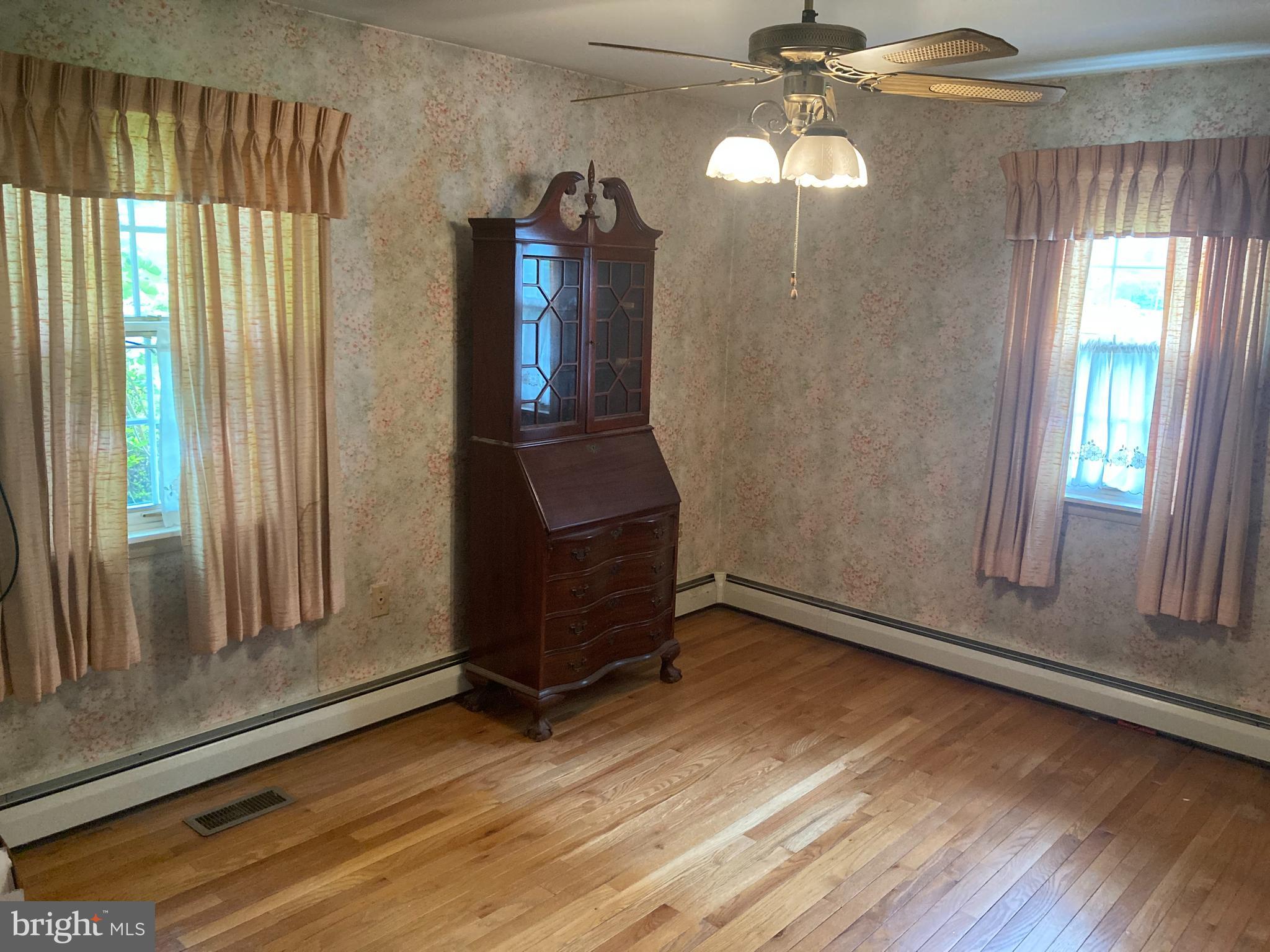 580 Jacksonville Road Warminster, PA 18974 - Photo 13 of 20 a view of an entryway with wooden floor and door