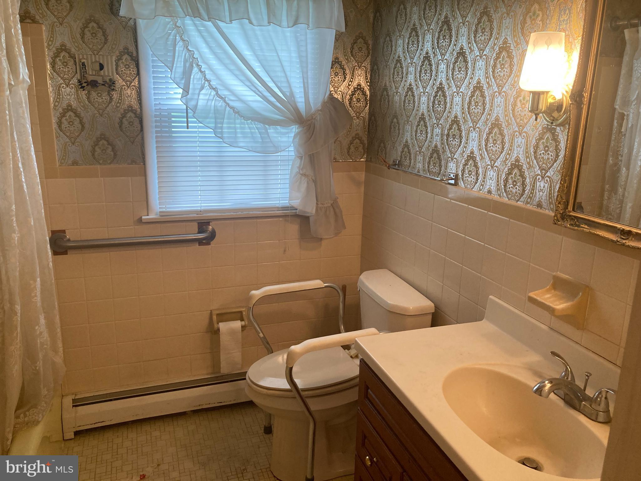 580 Jacksonville Road Warminster, PA 18974 - Photo 14 of 20 a bathroom with a sink toilet and tub