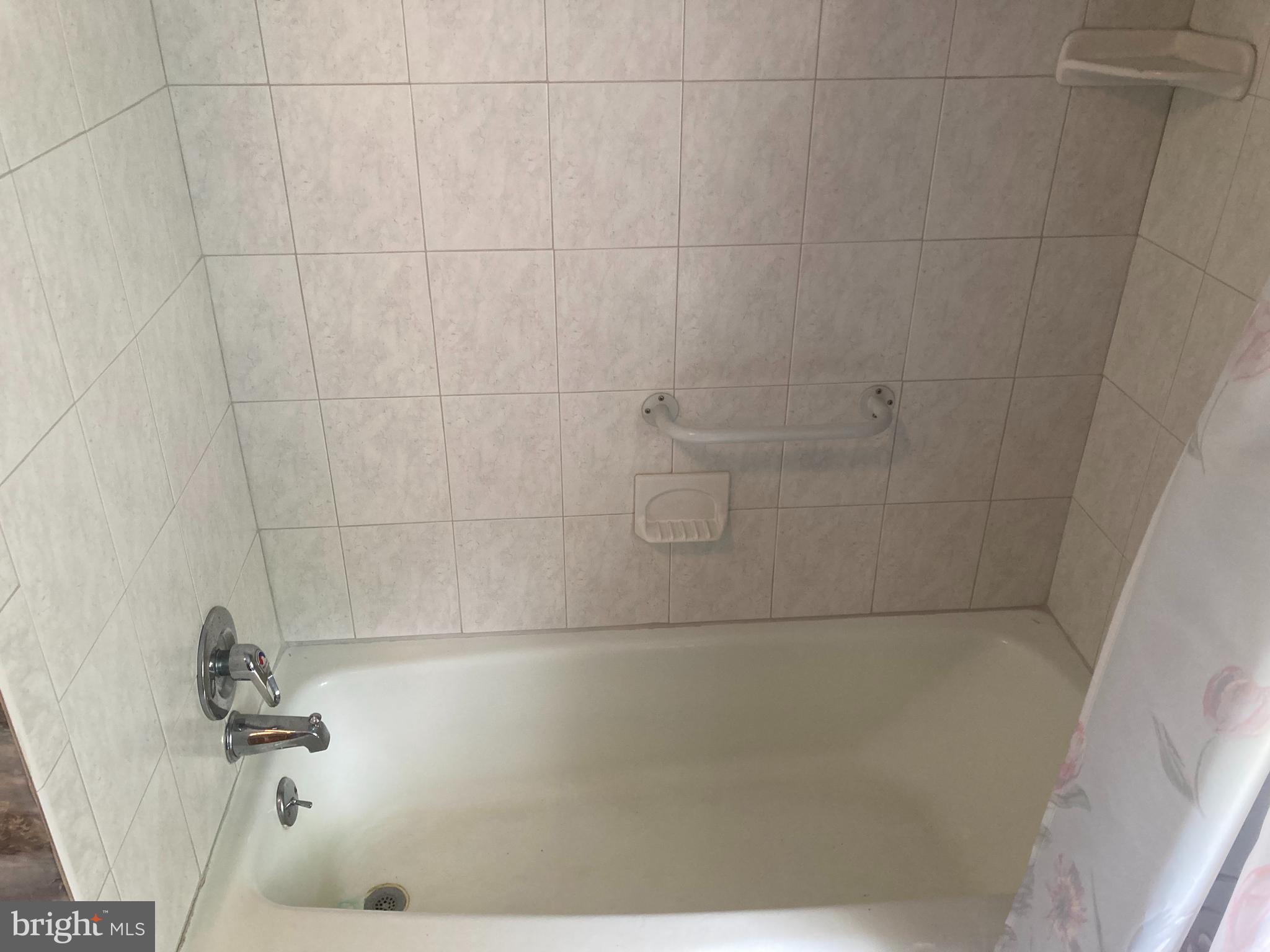 580 Jacksonville Road Warminster, PA 18974 - Photo 20 of 20 a bathroom with a bathtub