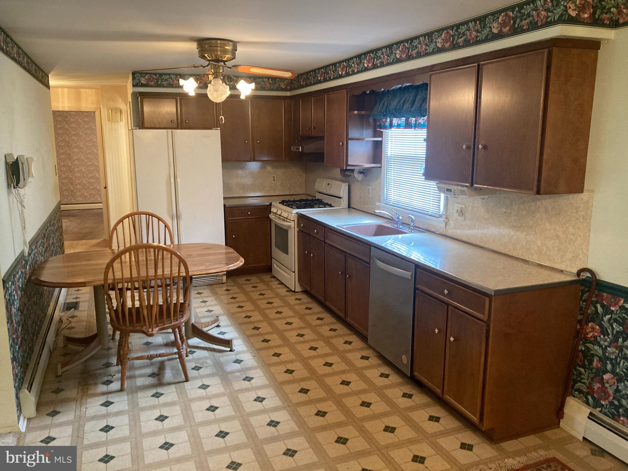 580 Jacksonville Road Warminster, PA 18974 - Photo 8 of 20 a kitchen with a sink cabinets and window