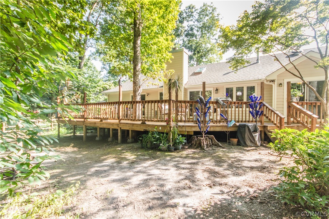 13712 Sandy Oak Road Chester, VA 23831 - Photo 31 of 36 a view of a house with backyard porch and sitting area