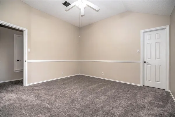 an empty room with an entryway