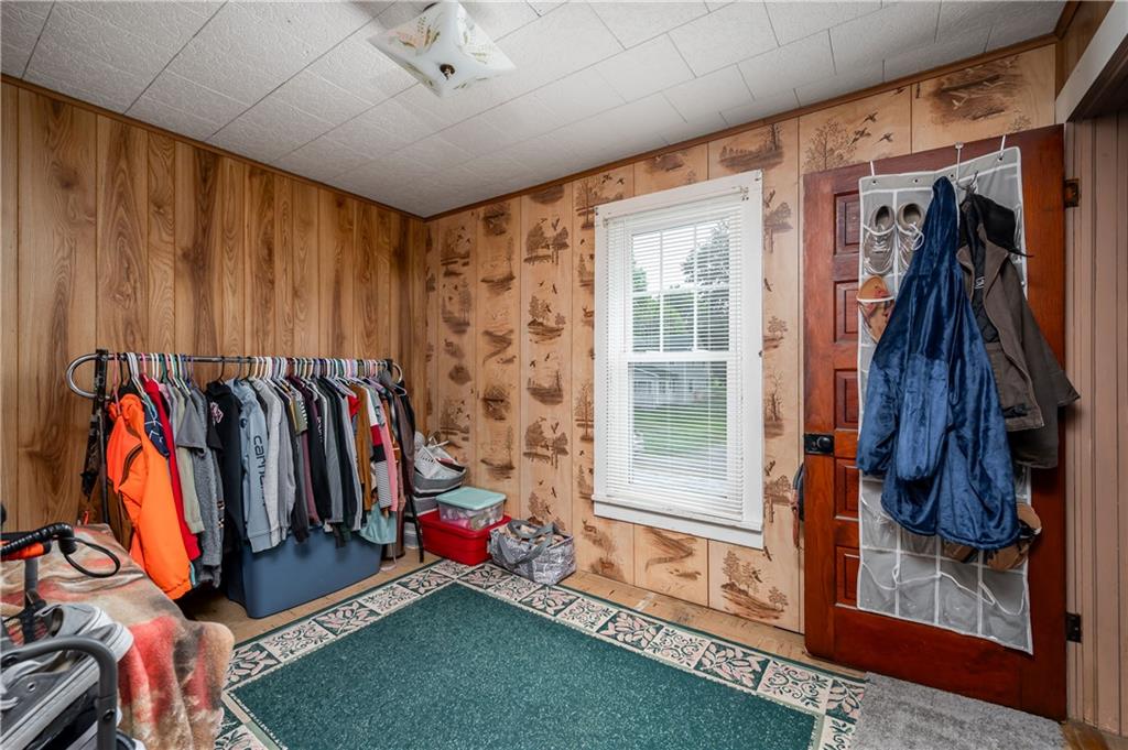 5440 Pittsburgh Road Harrisville, PA 16038 - Photo 14 of 16 a view of walk in closet with clothes and shoes