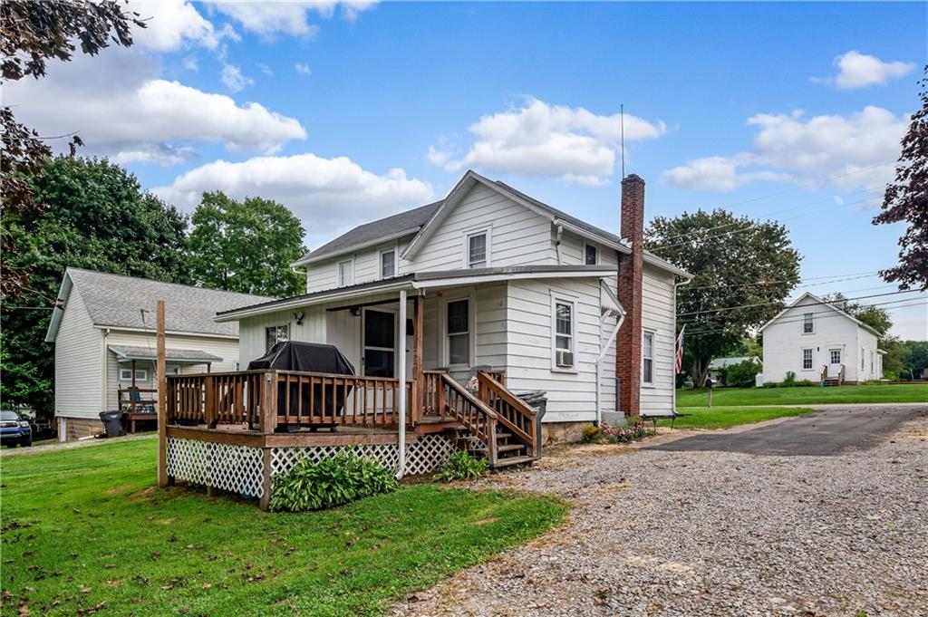 5440 Pittsburgh Road Harrisville, PA 16038 - Photo 15 of 16 a view of a house with a yard and deck
