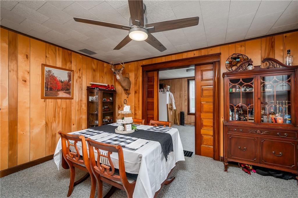 5440 Pittsburgh Road Harrisville, PA 16038 - Photo 6 of 16 a bedroom with a bed and a table in it