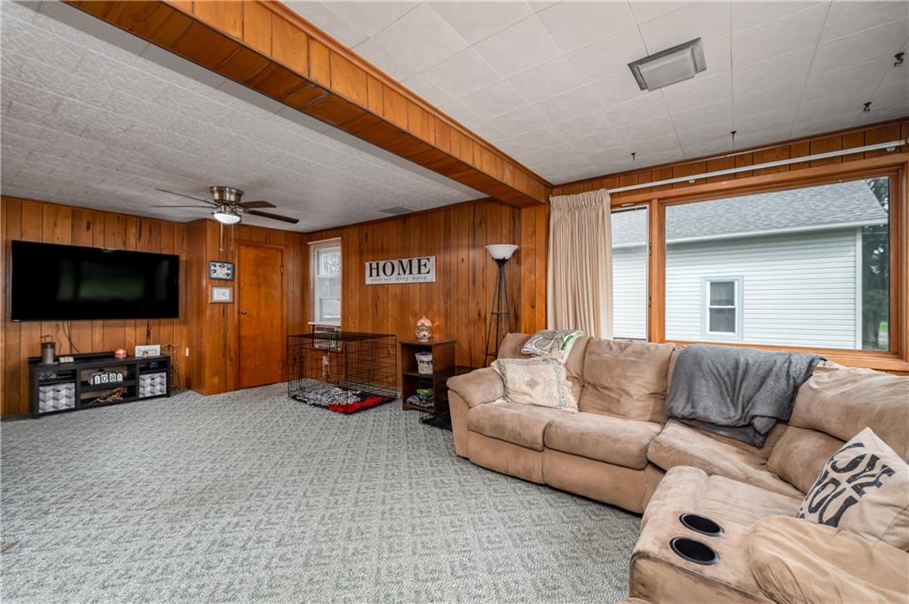 5440 Pittsburgh Road Harrisville, PA 16038 - Photo 9 of 16 a living room with furniture and a flat screen tv