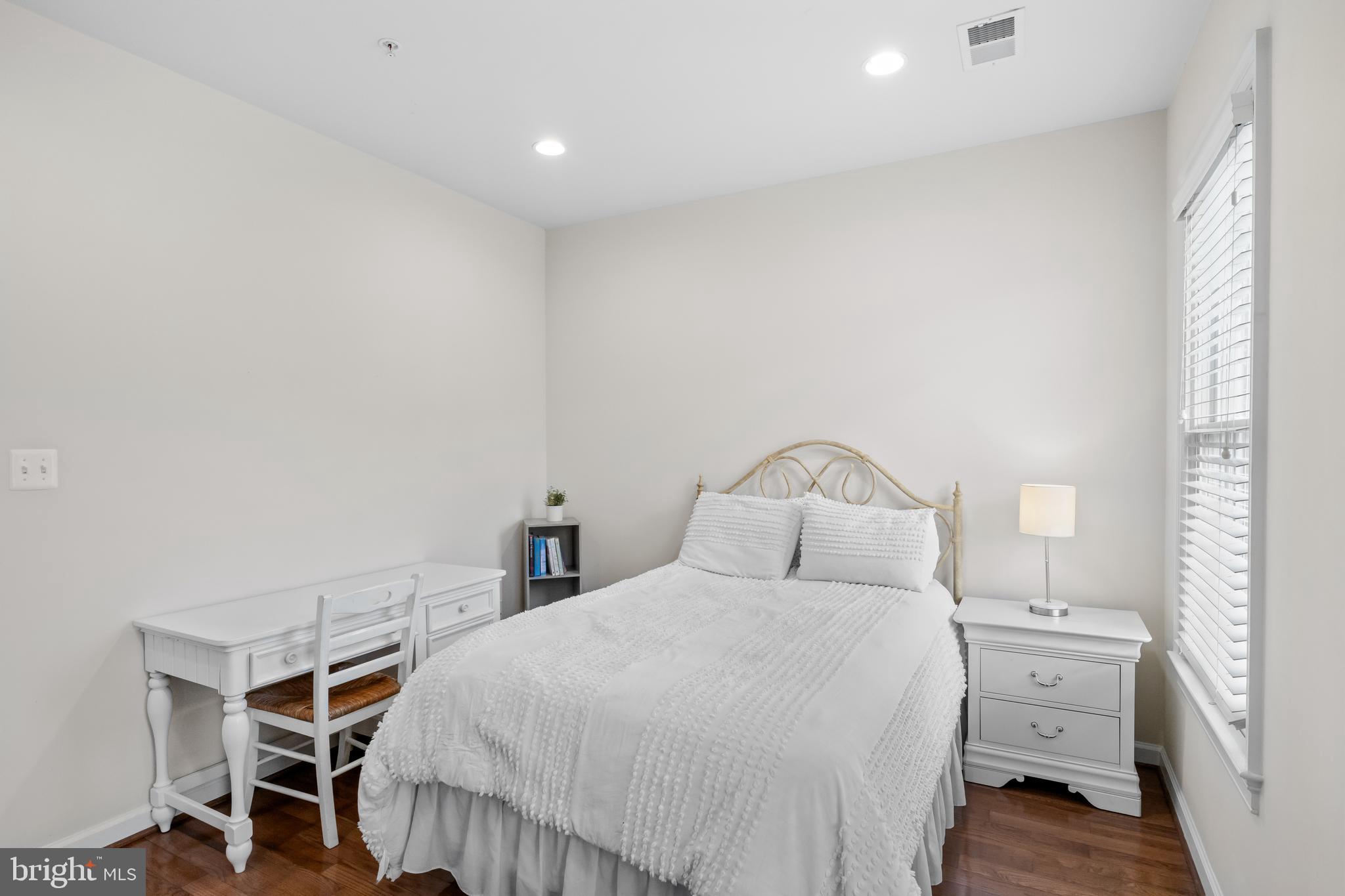 419 Princess Street Alexandria, VA 22314 - Photo 21 of 44 a bedroom with a bed and a window