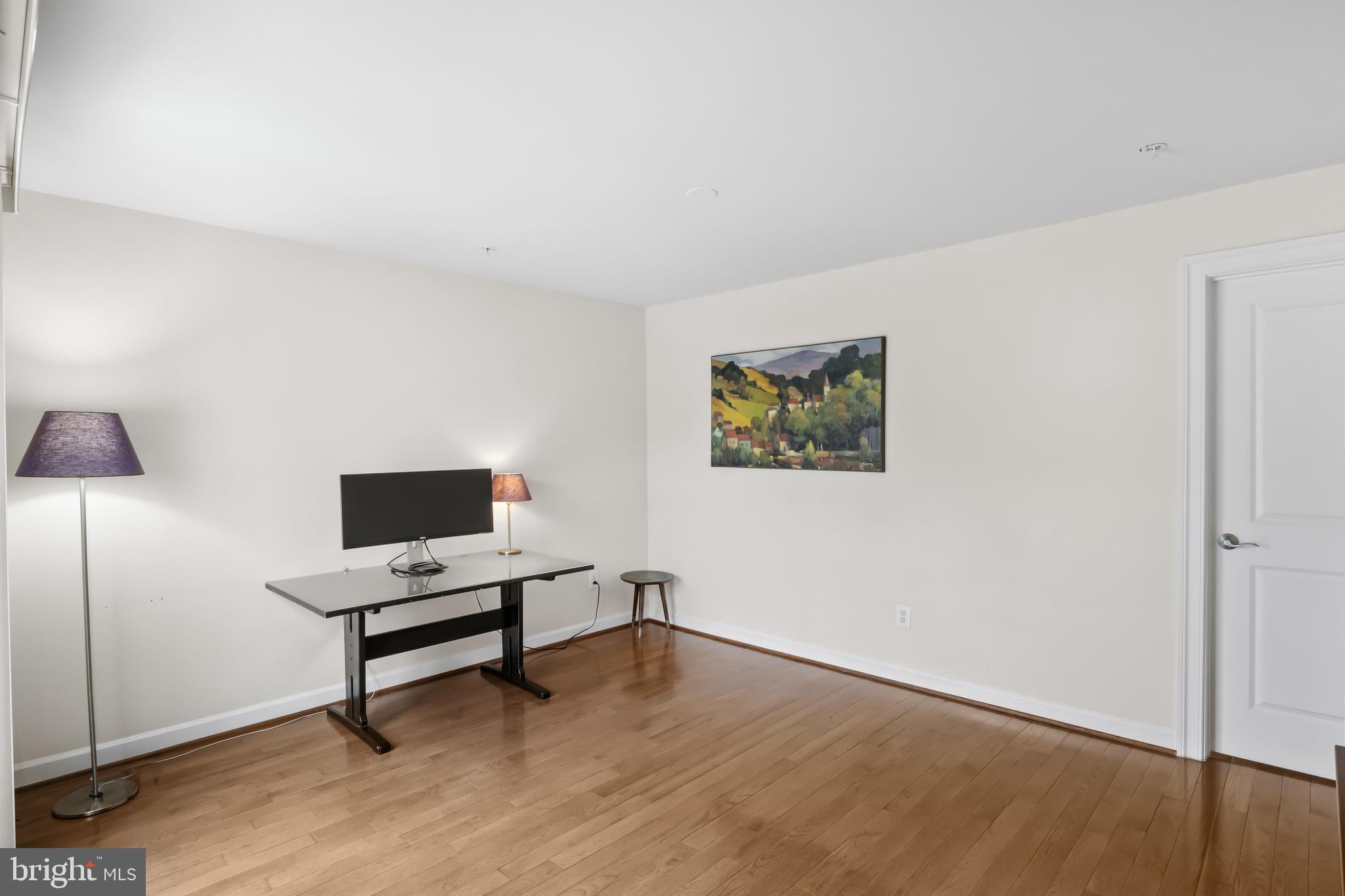419 Princess Street Alexandria, VA 22314 - Photo 26 of 44 a living room with furniture and a wooden floor