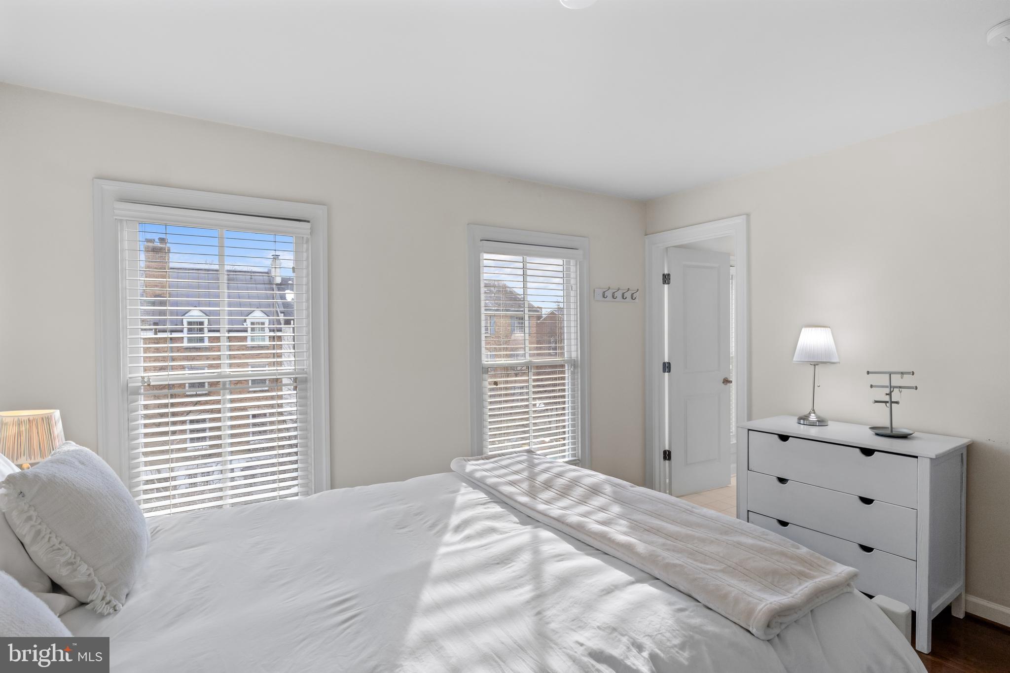 419 Princess Street Alexandria, VA 22314 - Photo 31 of 44 a bedroom with a bed and a window
