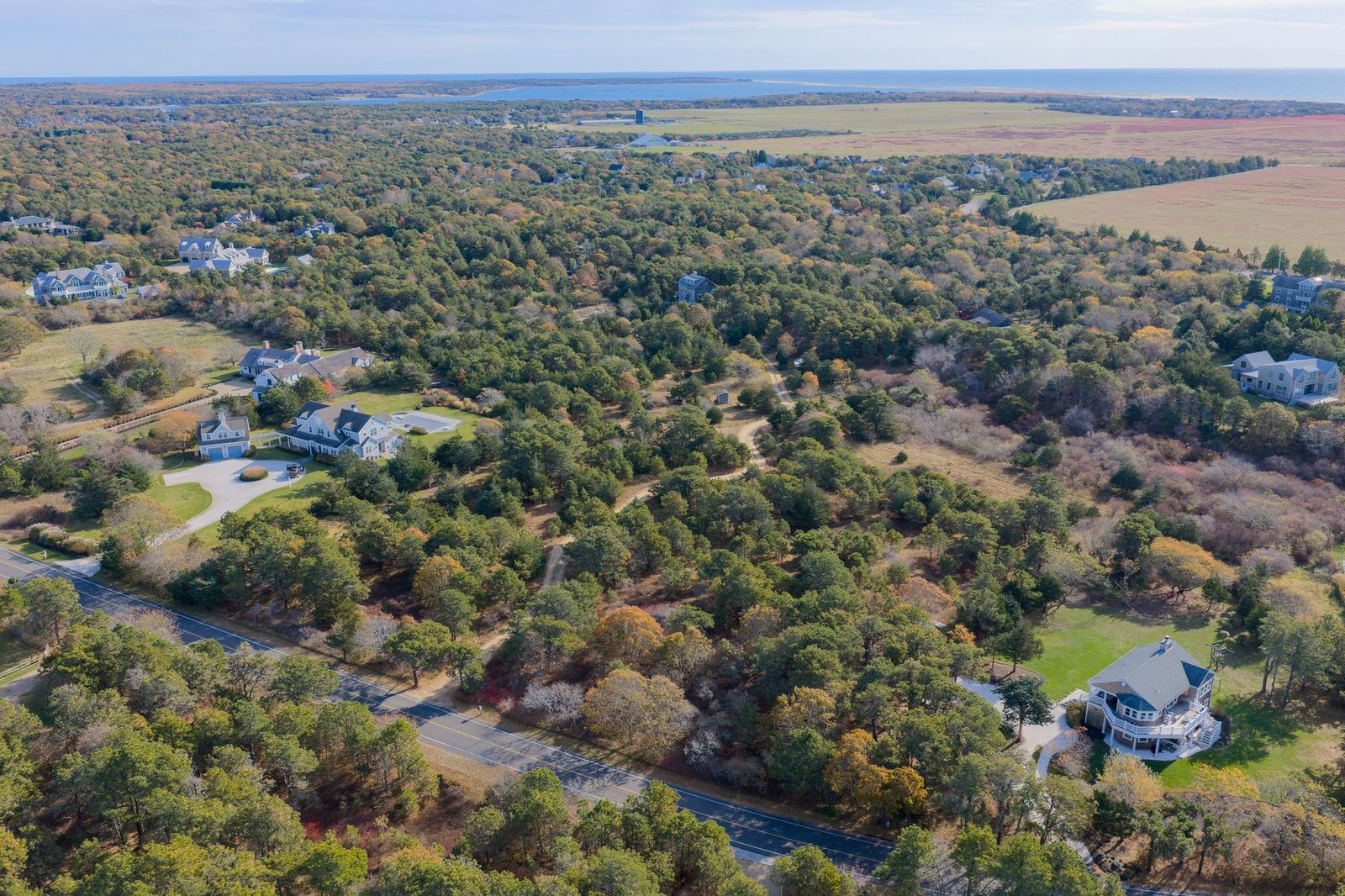 39 Slough Cove Road Edgartown, MA 02539 - Photo 2 of 6 a view of a city and mountains