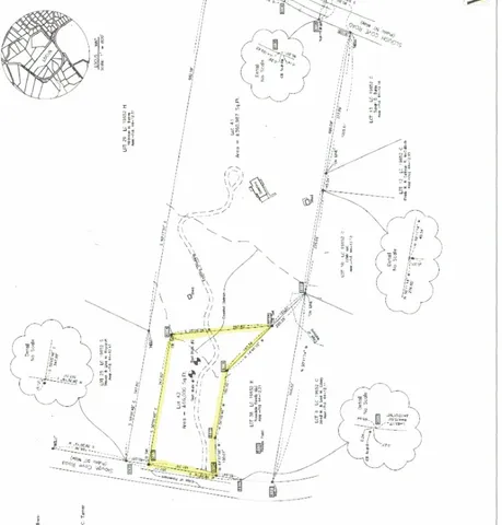 view of a white wall and a painting on the wall