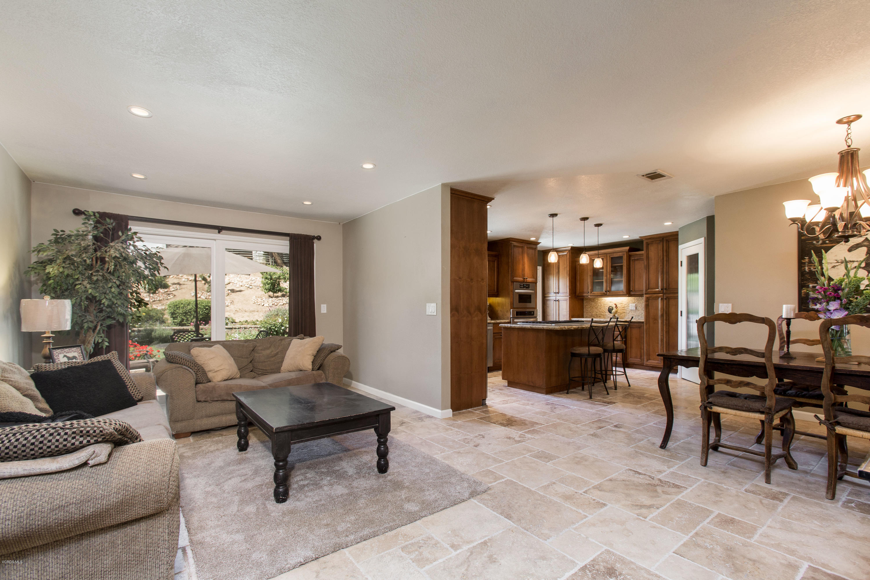 1177 Rambling Road Simi Valley, CA 93065 - Photo 16 of 56 a living room with furniture and a table