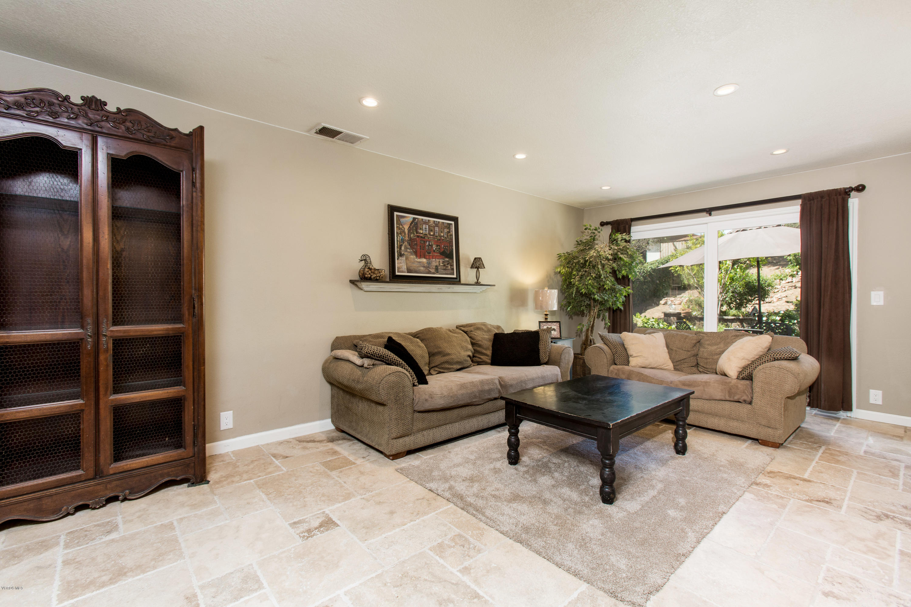 1177 Rambling Road Simi Valley, CA 93065 - Photo 17 of 56 a living room with furniture and a rug