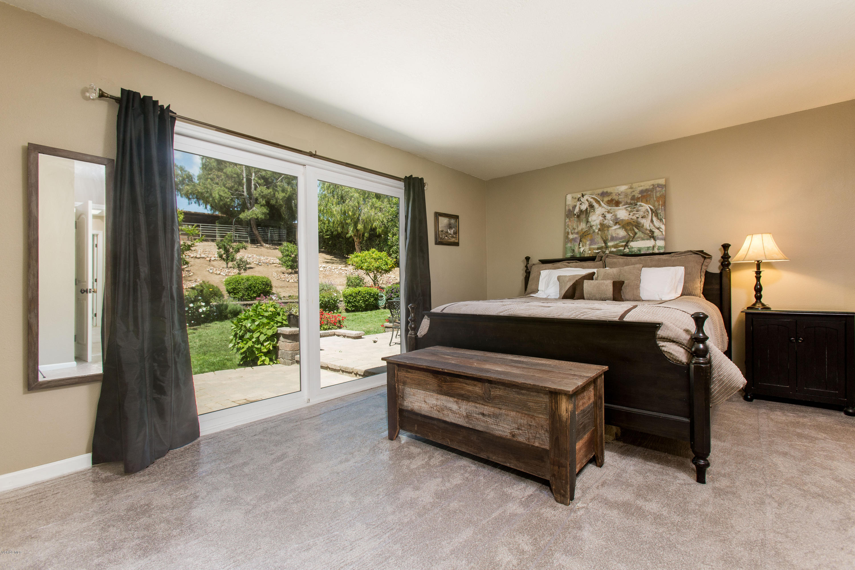 1177 Rambling Road Simi Valley, CA 93065 - Photo 20 of 56 a bedroom with a bed and a large window