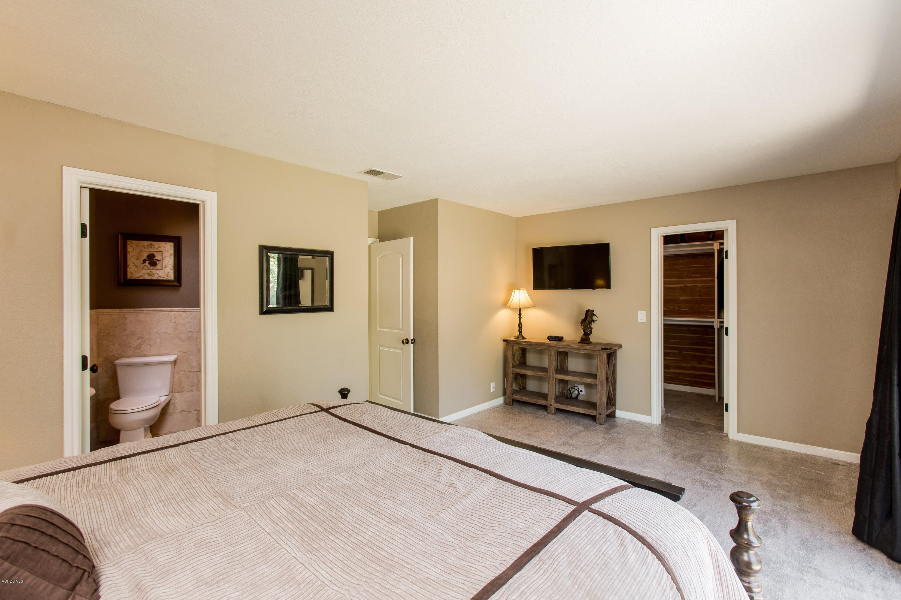 1177 Rambling Road Simi Valley, CA 93065 - Photo 22 of 56 a bedroom with a bed and furniture