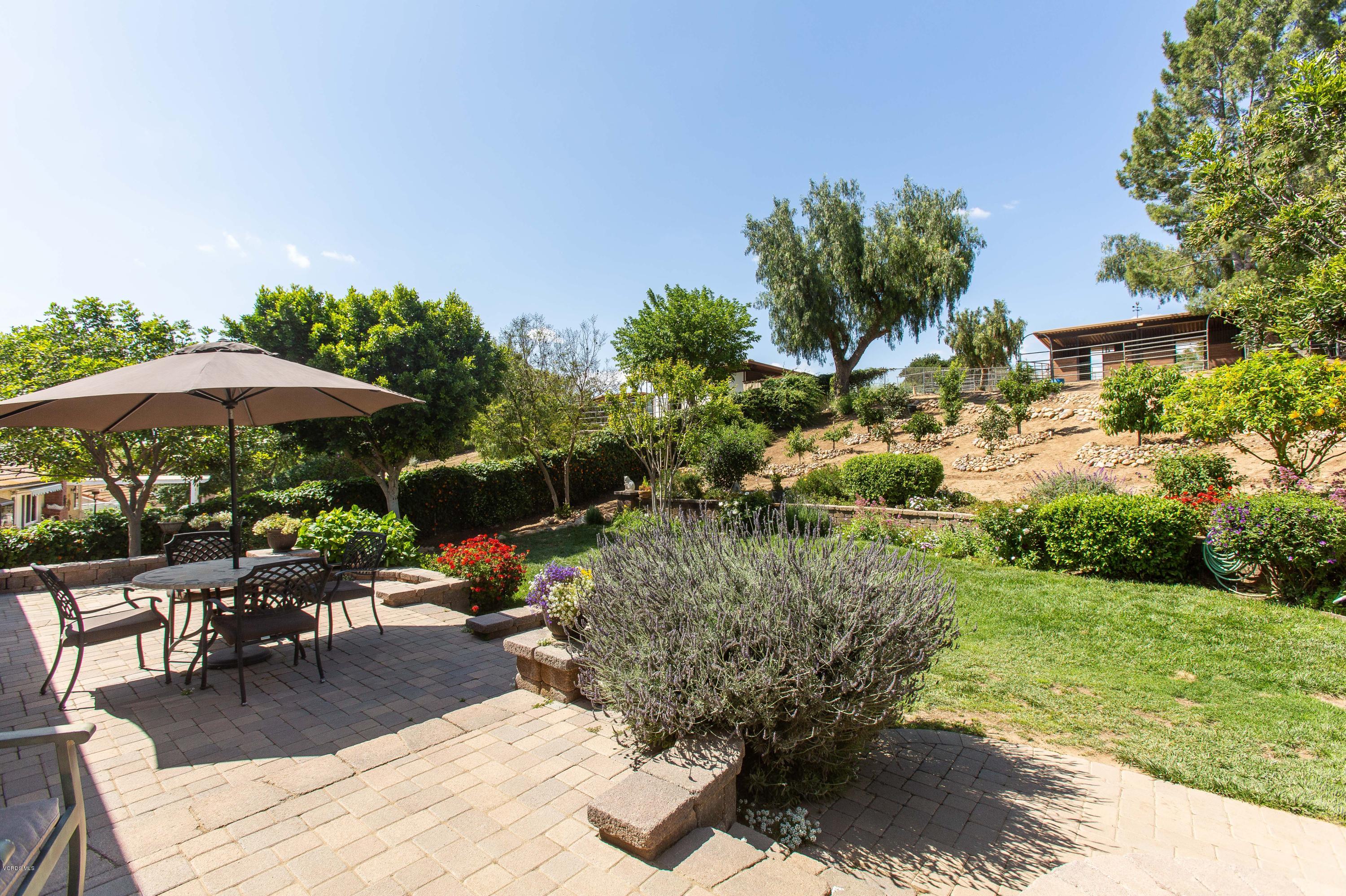 1177 Rambling Road Simi Valley, CA 93065 - Photo 38 of 56 a view of a backyard with sitting area